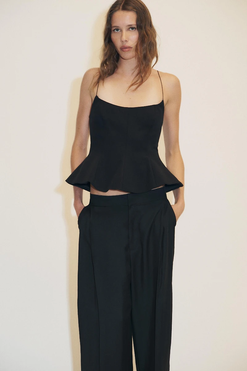 STRETCH PEPLUM TOP