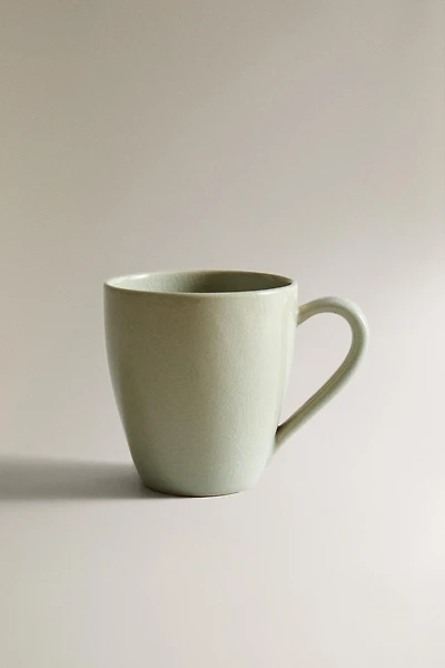 ENAMELED STONEWARE MUG
