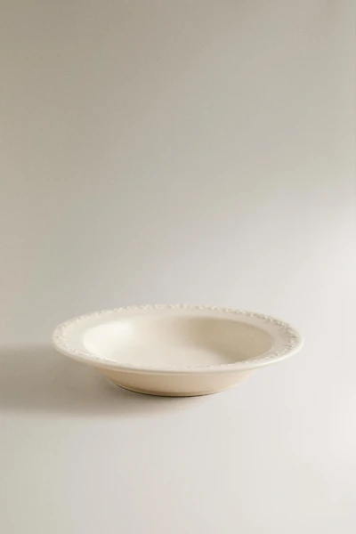 EARTHENWARE SOUP PLATE WITH RAISED RIM