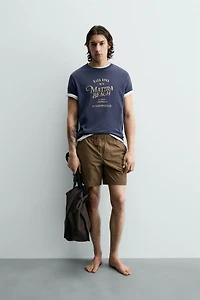 POLYNESIAN GRAPHIC T-SHIRT
