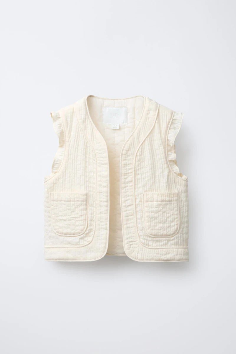 GILET STRUCTURÉ À VOLANTS