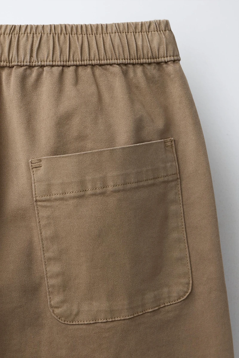 PLEATED STRAIGHT LEG PANTS