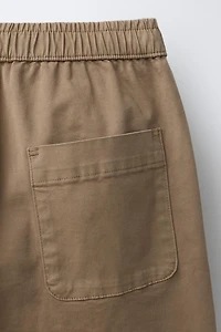 PLEATED STRAIGHT LEG PANTS