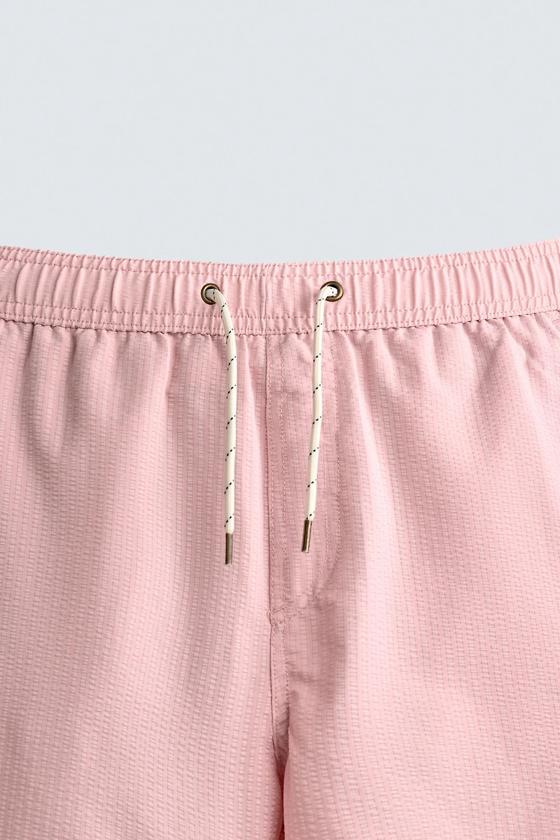LONG SEERSUCKER SWIM SHORTS