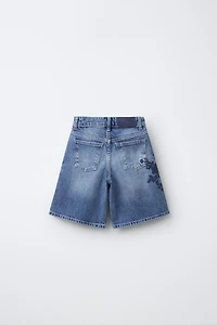 EMBROIDERED RIPPED DENIM SHORTS