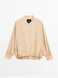 Loose-fitting bomber jacket with drawstring detail