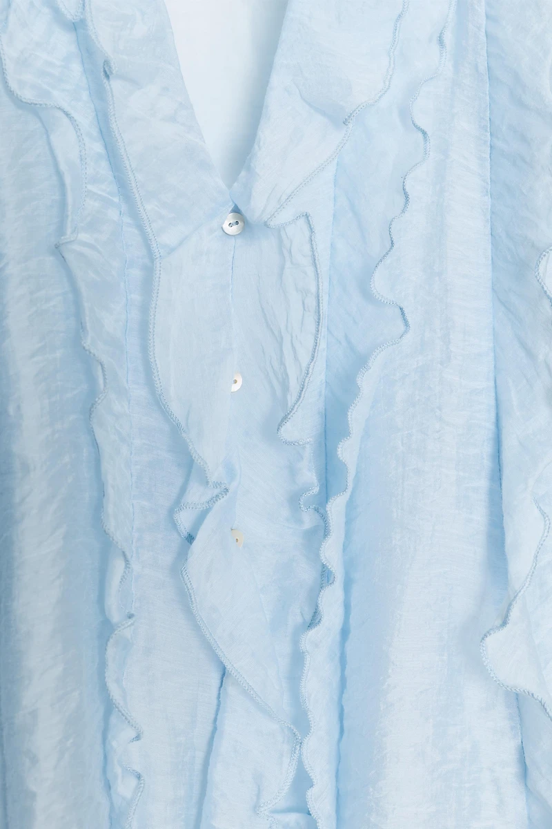BLOUSE À VOLANTS ET POIS