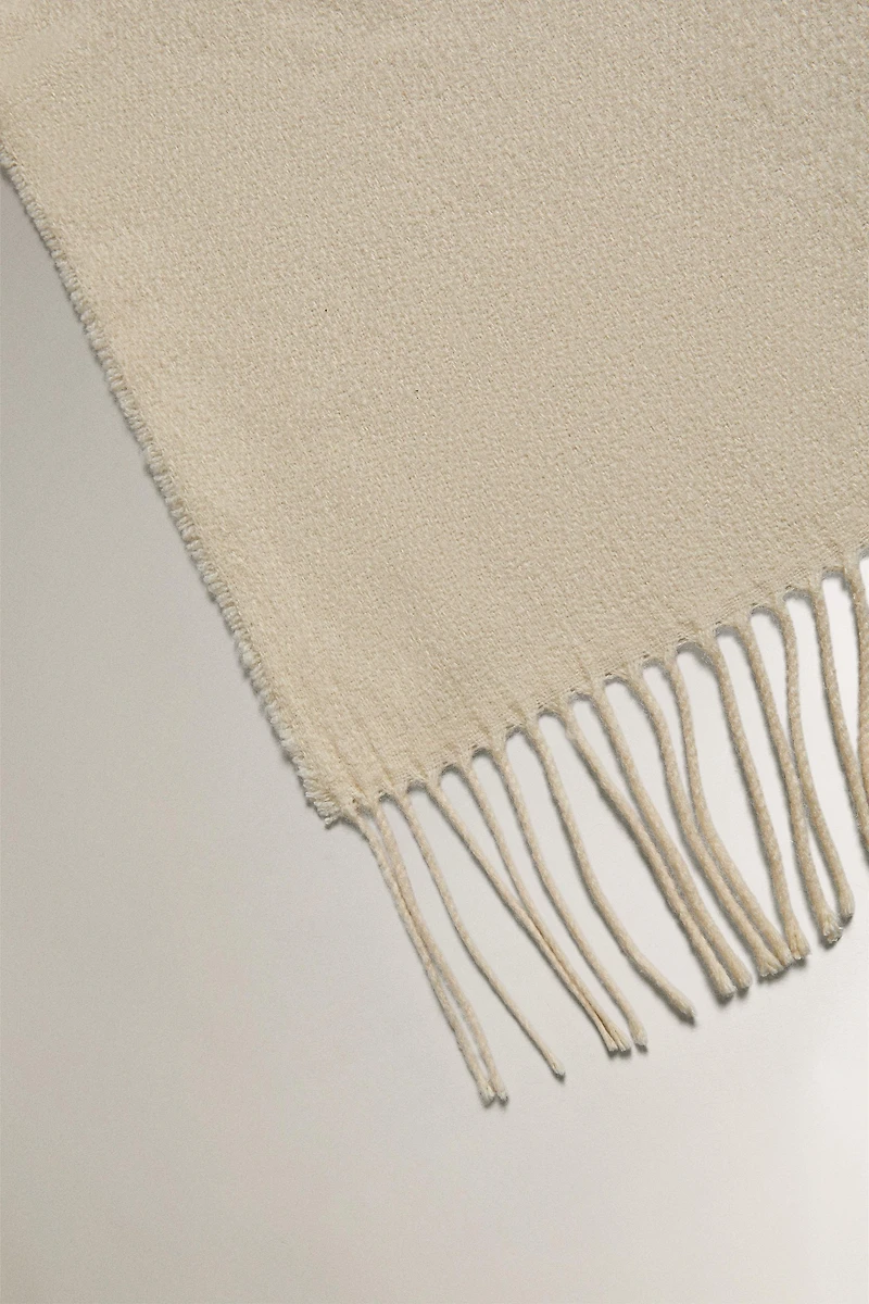 DECORATIVE FRINGED BLANKET