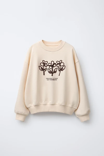 SWEAT BRODÉ AVEC LACET
