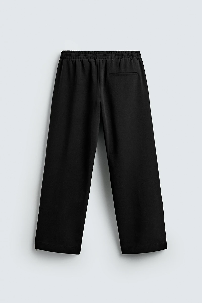 FLOWY ZIPPERED PANTS