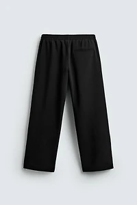 FLOWY ZIPPERED PANTS