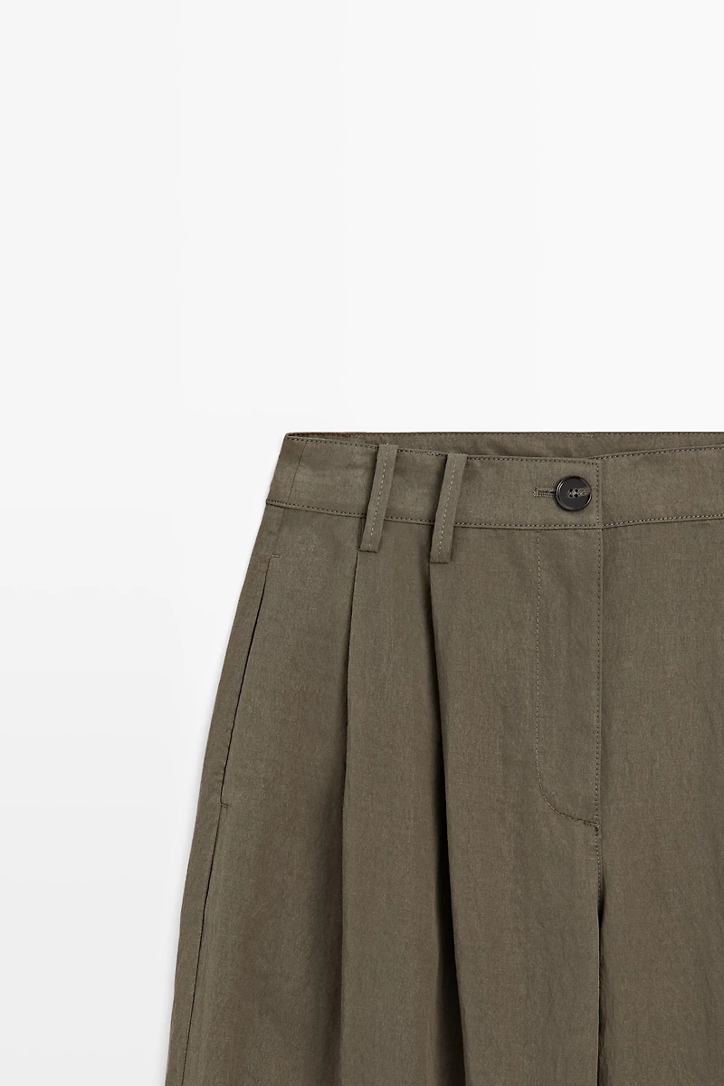 Technical wide-leg pleated pants