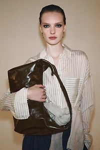 LEATHER OVAL BAG