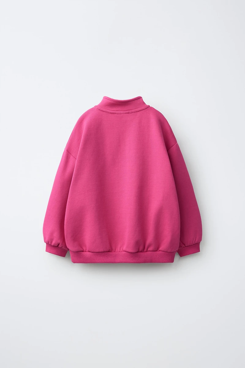 RUBBERIZED HEART INTERLOCK SWEATSHIRT