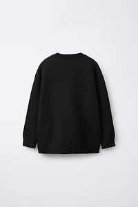 PULL EN MAILLE GRAFFITI