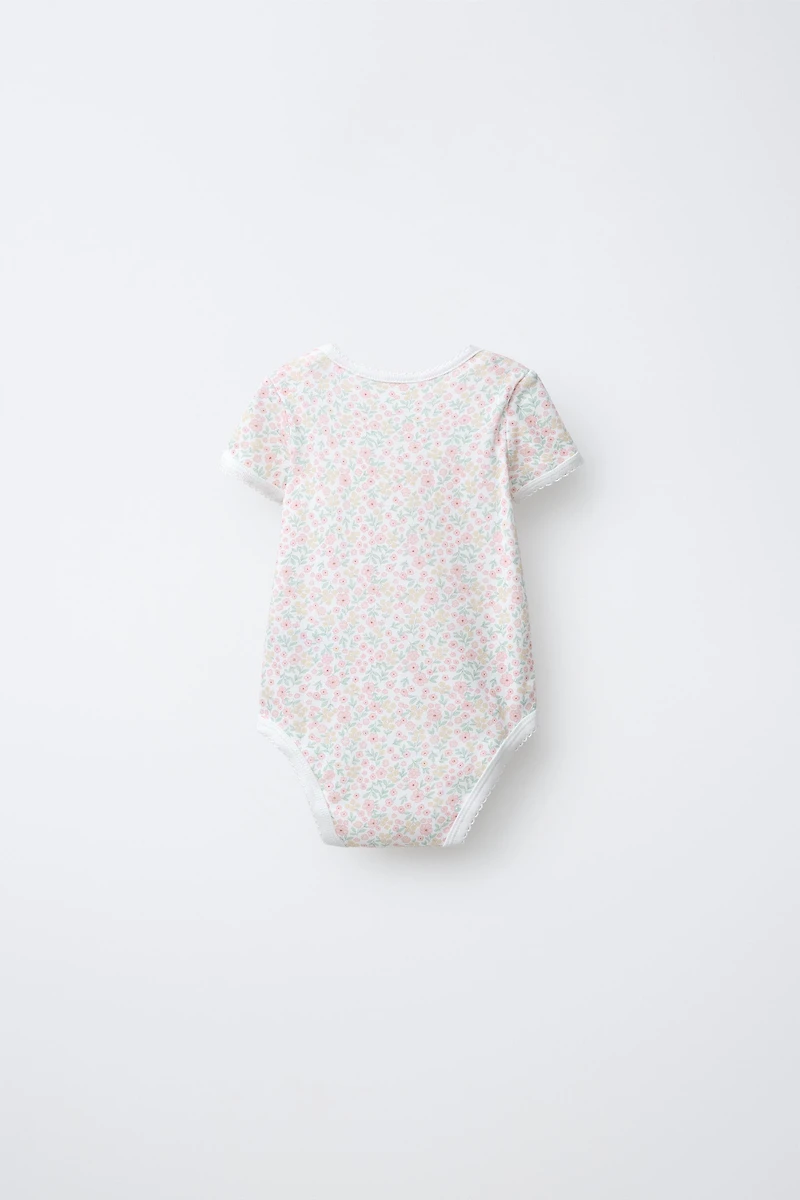FIVE-PACK OF SHORT-SLEEVED FLORAL BODYSUITS