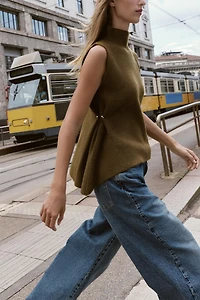 ASYMMETRIC KNIT TOP WITH SIDE APPLIQUÉS