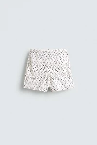 GEOMETRIC PRINT MID-LENGTH SWIMSUIT