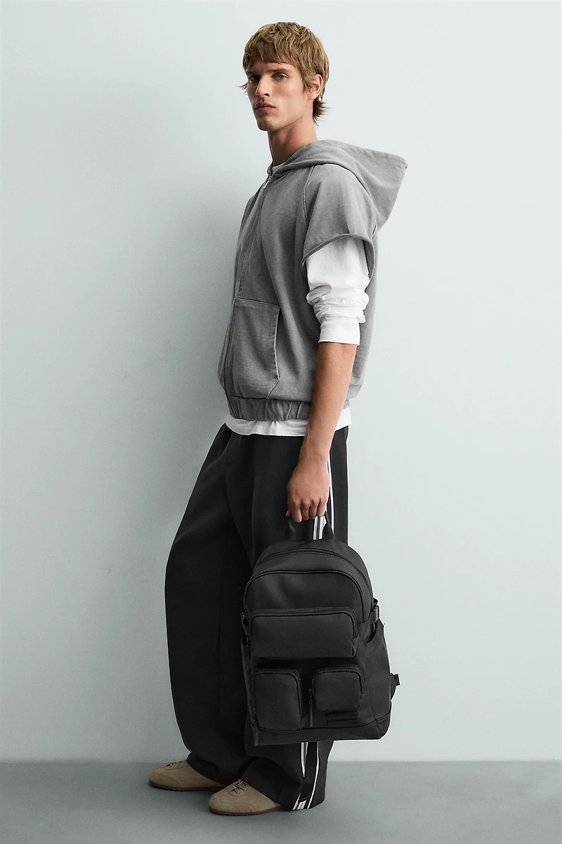 RUBBERIZED MULTI-POCKET BACKPACK