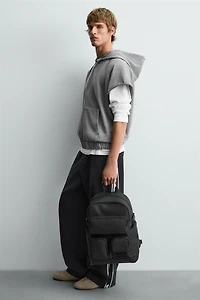 RUBBERIZED MULTI-POCKET BACKPACK
