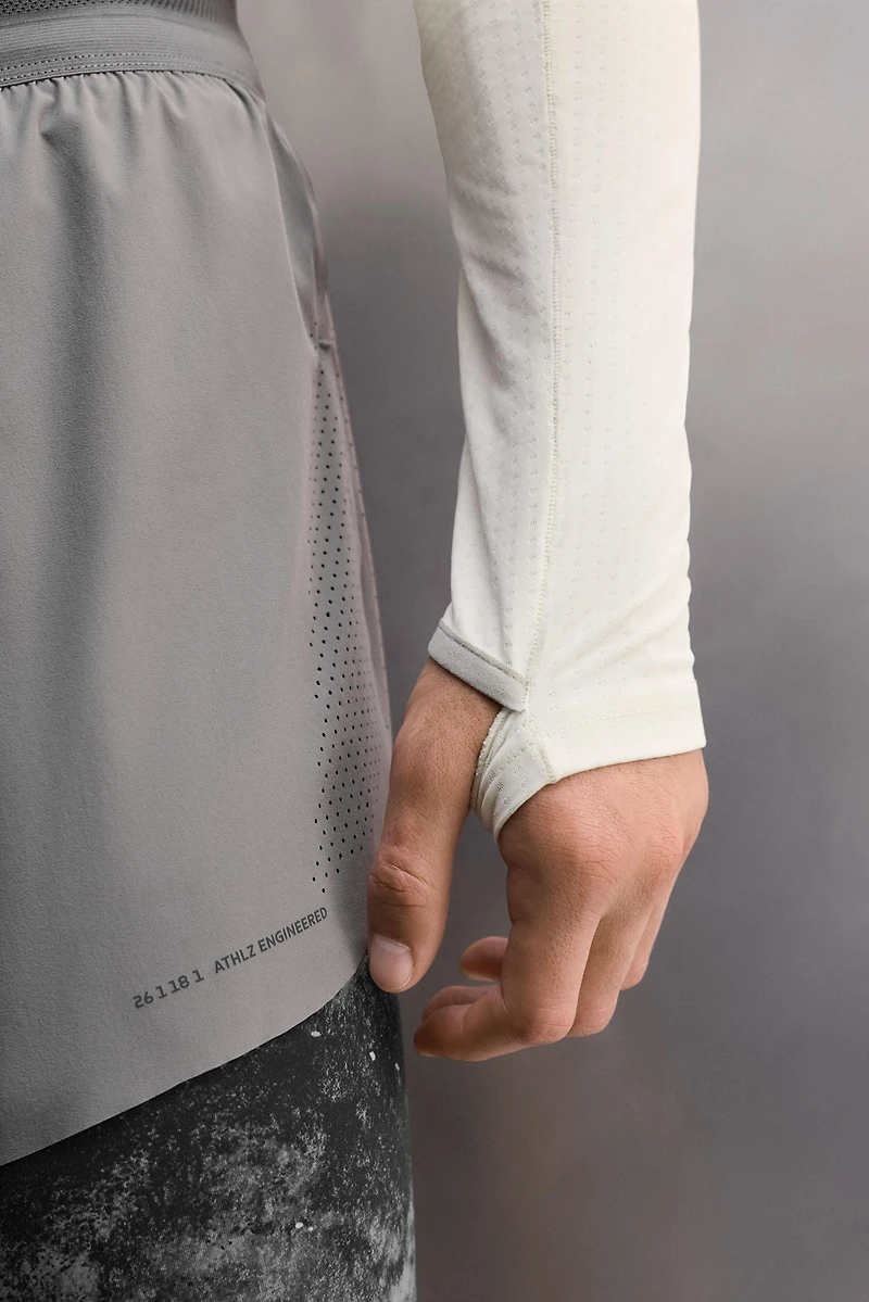 T-SHIRT TECHNIQUE COL ZIPPÉ