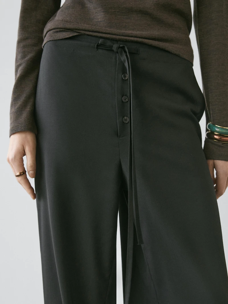 Wool sarouel trousers with tie detail