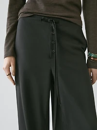 Wool sarouel trousers with tie detail
