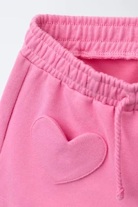 HEART POCKET INTERLOCK SHORTS