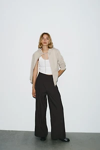 PINSTRIPE PANTS WITH PLEATS AND FLAPS