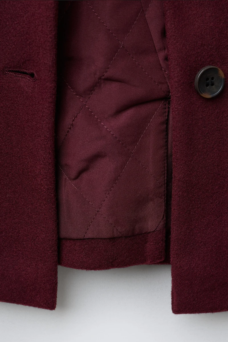 MANTEAU EN DRAP DE LAINE