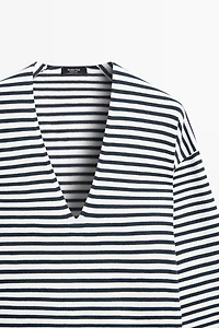 Striped V-neck knit sweater