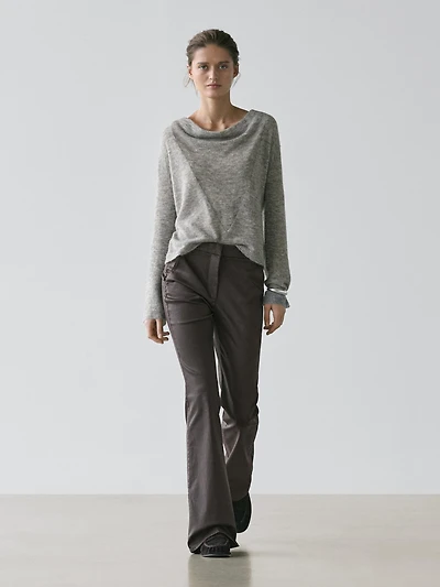 Waxed flare fit trousers