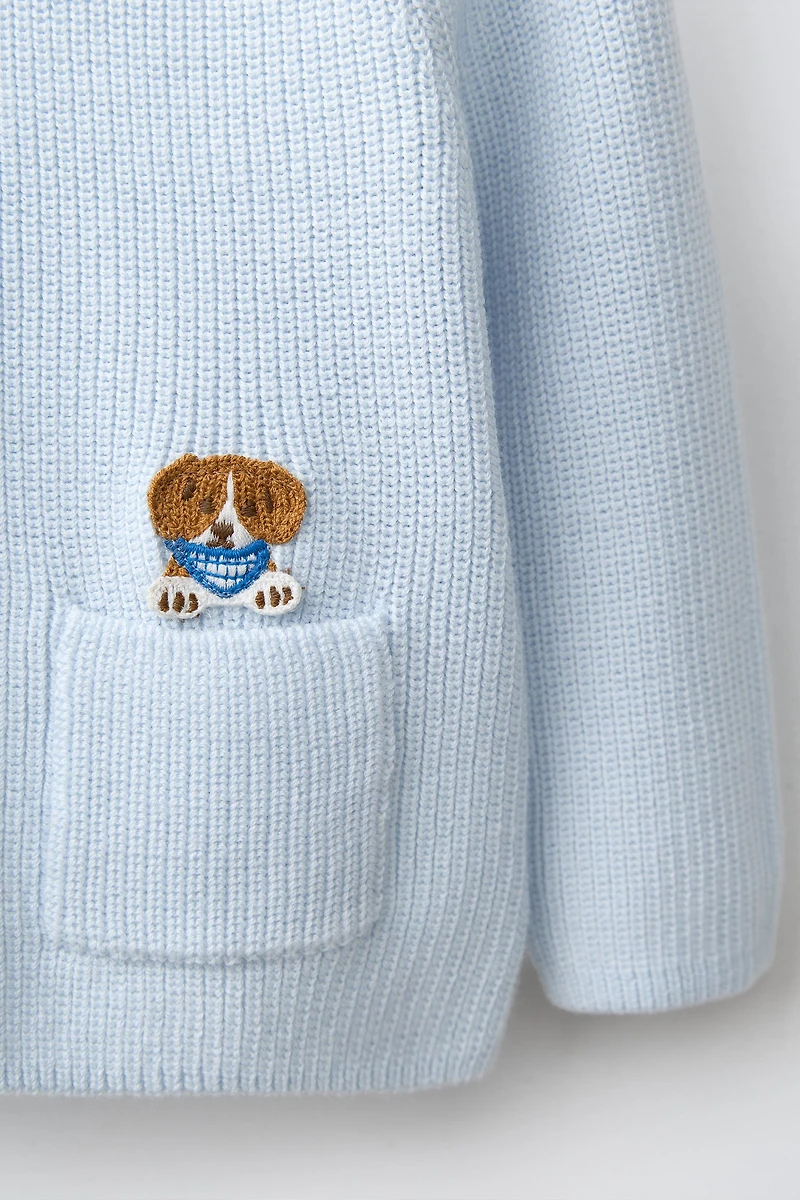 PULL EN MAILLE AVEC PIÈCE CHIOT