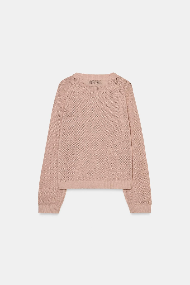 PULL EN MAILLE À BOUTONS
