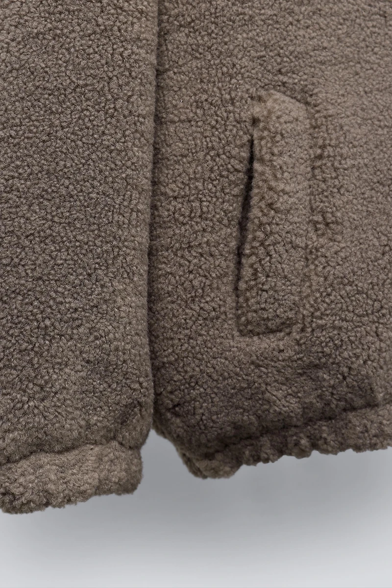 BLOUSON EFFET MOUTON BRODÉ