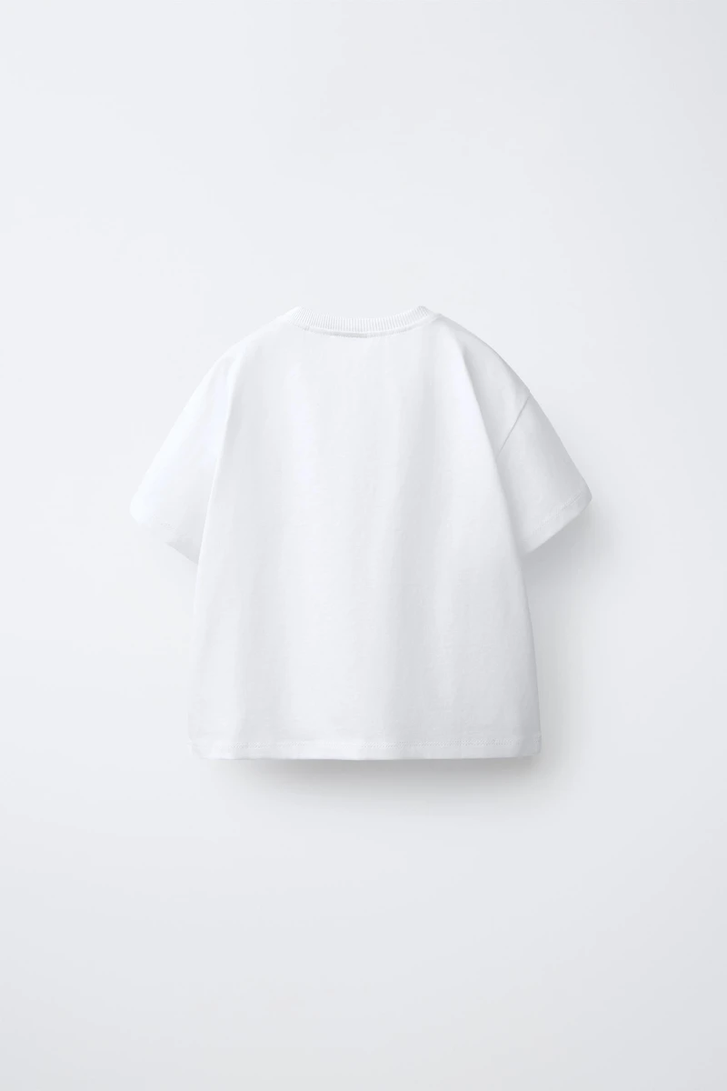 T-SHIRT POCHE FLEUR EN CROCHET