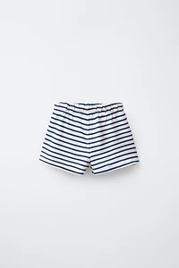 LOT DE DEUX BERMUDAS UNIES ET À RAYURES