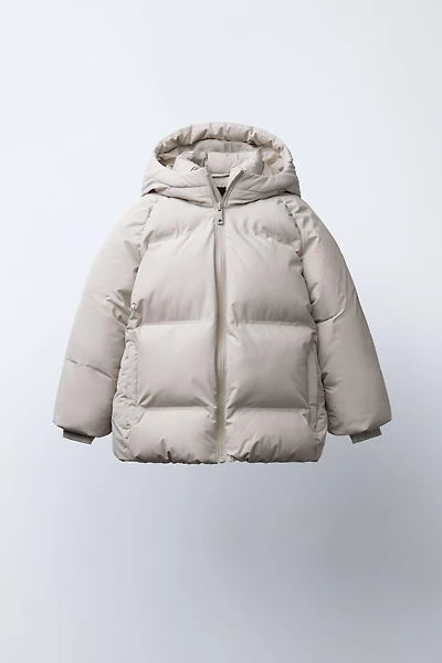 MANTEAU AVEC ÉTIQUETTE AUTOCOLLANTE DÉPERLANT