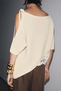 TOP ASYMÉTRIQUE EN MAILLE COMBINÉE