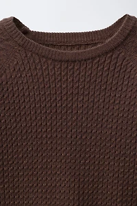 PULL EN MAILLE À TORSADES