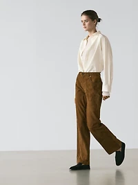 Pantalon droit en cuir finition daim