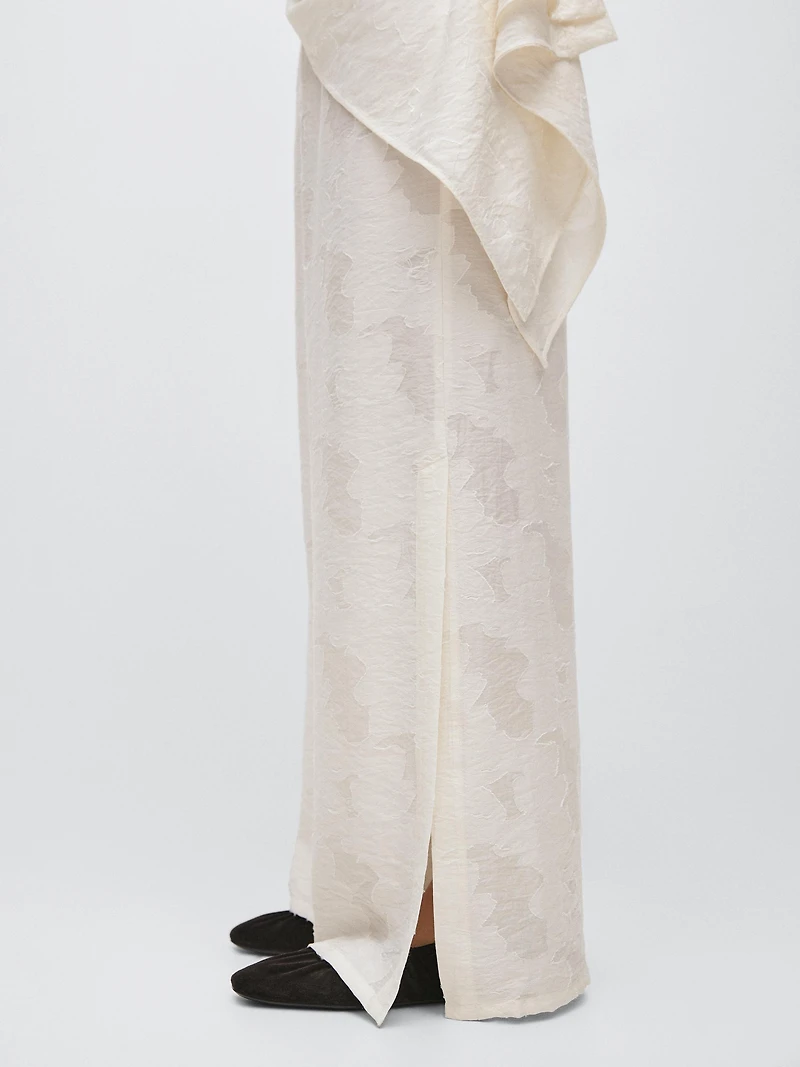 Pantalon élastique fluide détail tissu