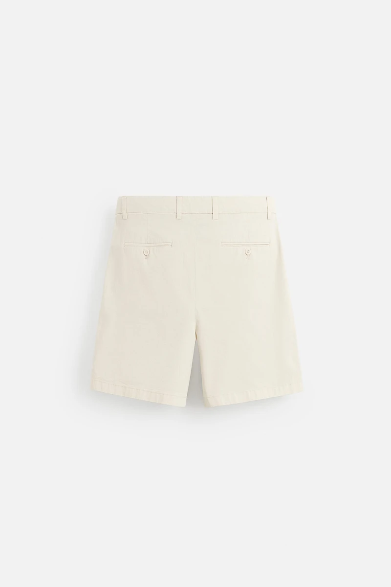 REGULAR FIT PLEATED BERMUDA SHORTS