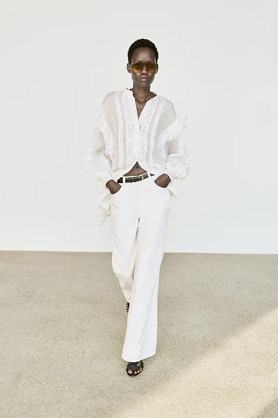 Stand collar blouse with embroidery and ruffles