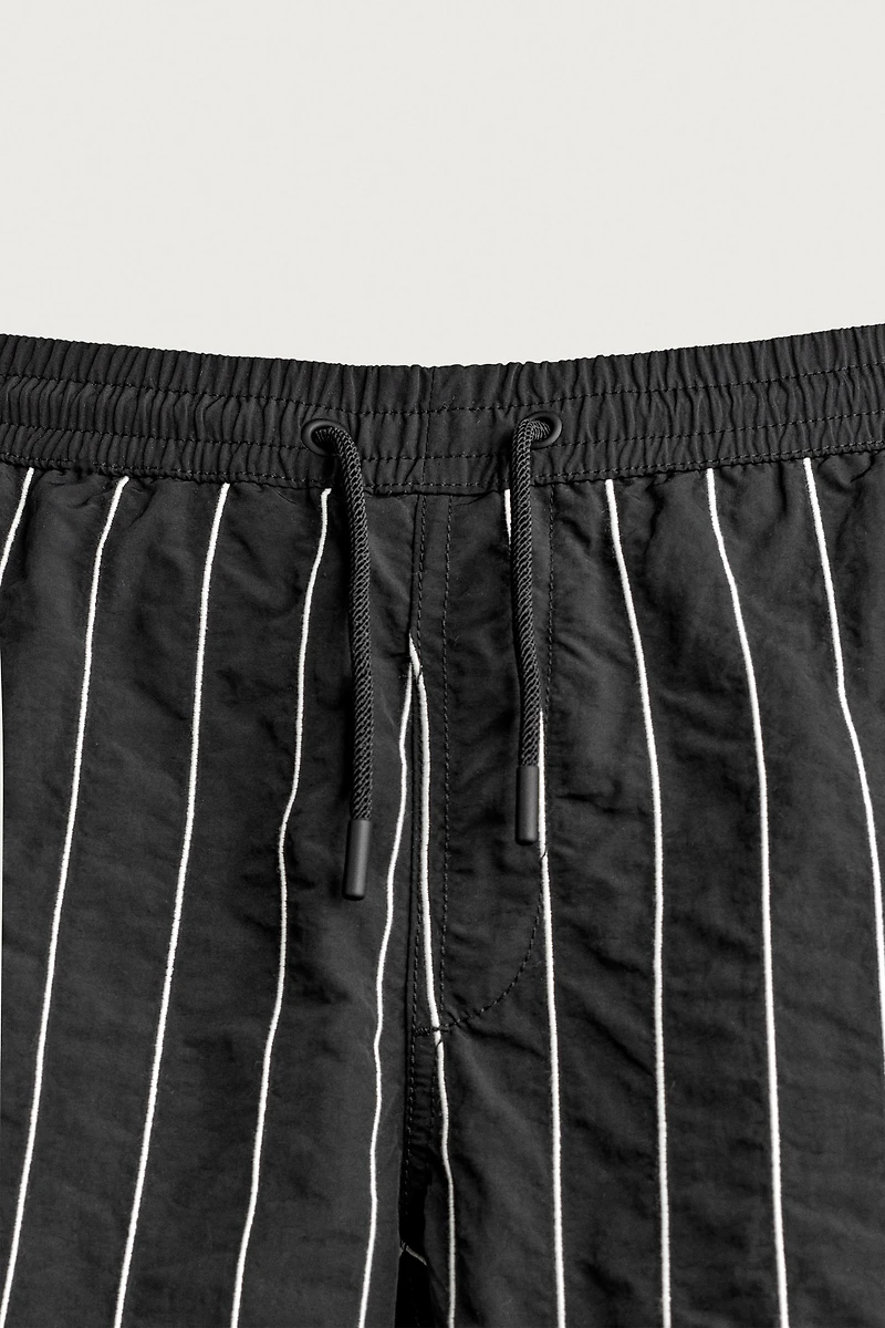 EMBROIDERED STRIPE MID-LENGTH SWIM TRUNKS