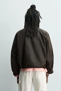 VESTE COURTE EFFET CIRÉ AARON LEVINE X ZARA