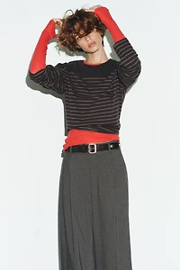 PANTALON À PINCES ET RABATS
