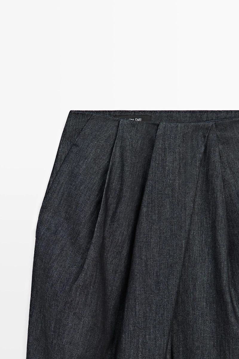 High-waist pants with crossover detail