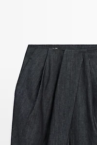 High-waist pants with crossover detail