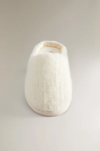 CHAUSSONS FOURRURE DÉTAIL TRESSÉ